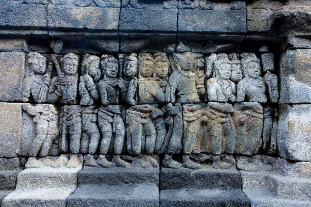 Elaborate carvings on the walls | World Heritage Site Borobudur Temple Compounds Yogyakarta, Indonesia