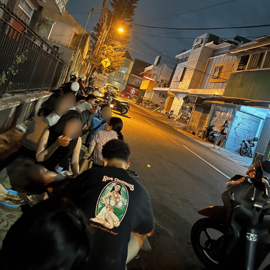 Eating on a carpet on the street | Gudeg Mercon Bu Tinah, Indonesian local food in Yogyakarta
